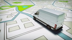 Delivery van driving on digital city map