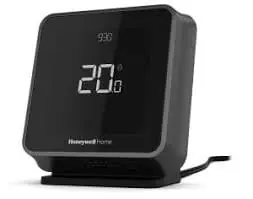 Honeywell digital home thermostat displaying temperature