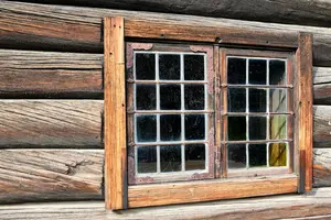 a window in a wooden building