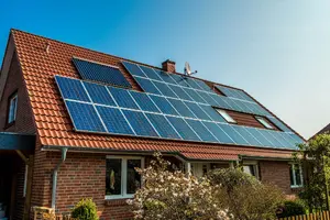 House roof with solar panels installed