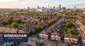 Aerial view of Birmingham Victorian terraces and semis with city centre skyline