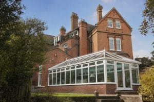 UK conservatory at the rear of a Victorian listed red-brick property