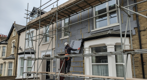 External wall insulation boards being fitted to UK terraced house
