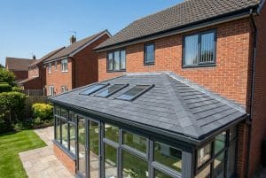 UK conservatory tiled roof with three Velux skylights