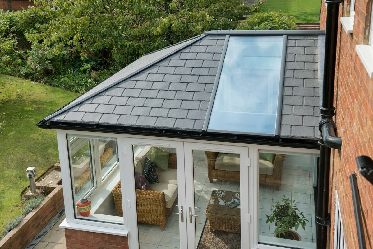 Ultraframe Ultraroof lightweight tiled conservatory roof with a full-length glazing panel